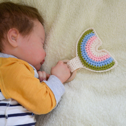 Make a special present with FREE crochet pattern for a rainbow baby rattle!