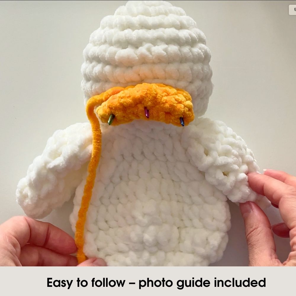 Step-by-step crochet duck pattern – photo tutorial showing beak assembly
