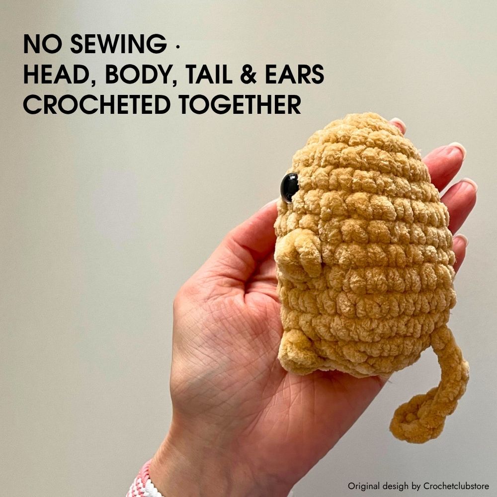 Close-up of seamless crochet cat – body, head, tail & ears made together, no sewing.